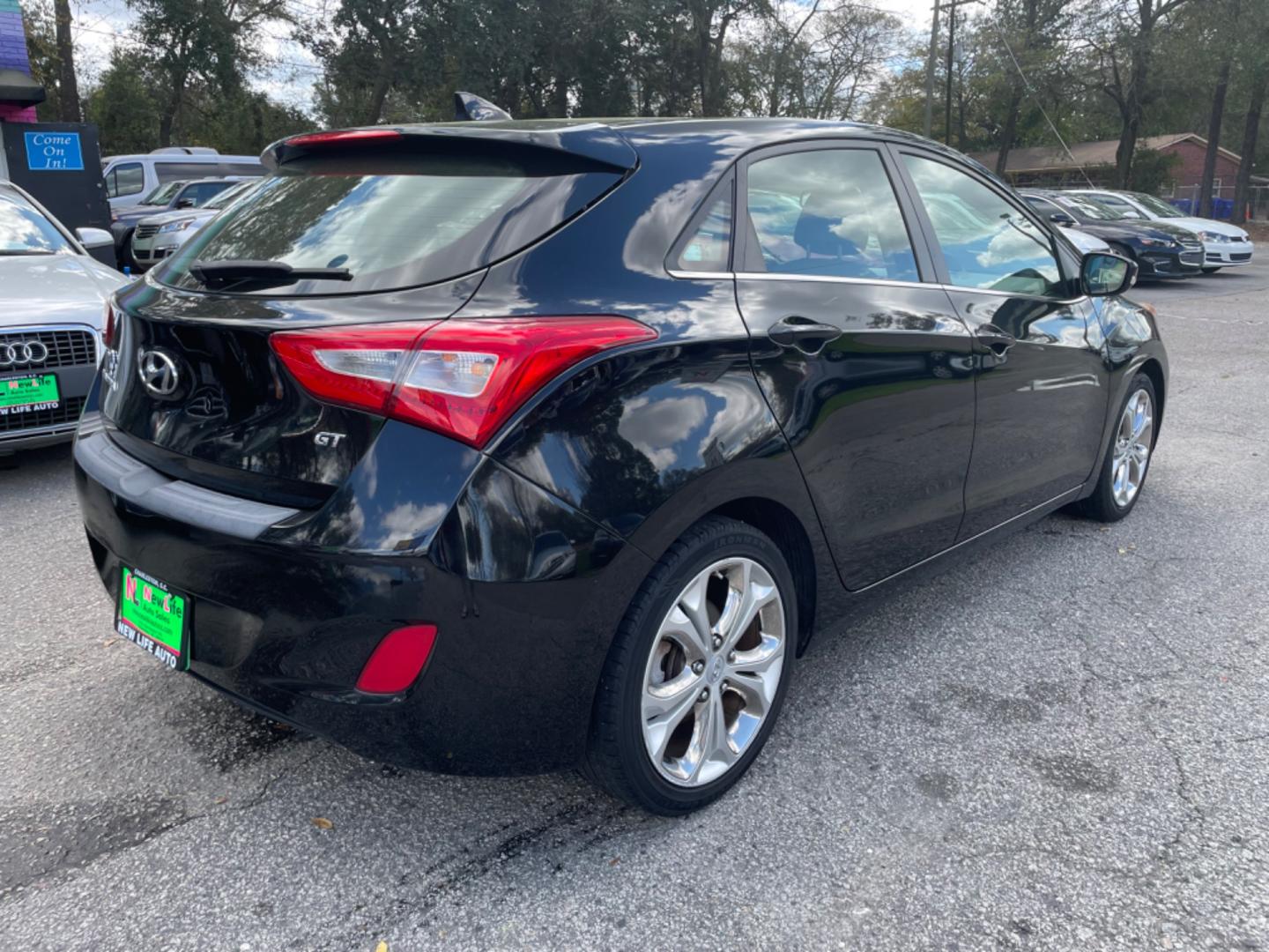 2014 BLACK HYUNDAI ELANTRA GT BASE (KMHD35LH8EU) with an 2.0L engine, Automatic transmission, located at 5103 Dorchester Rd., Charleston, SC, 29418-5607, (843) 767-1122, 36.245171, -115.228050 - Photo#6